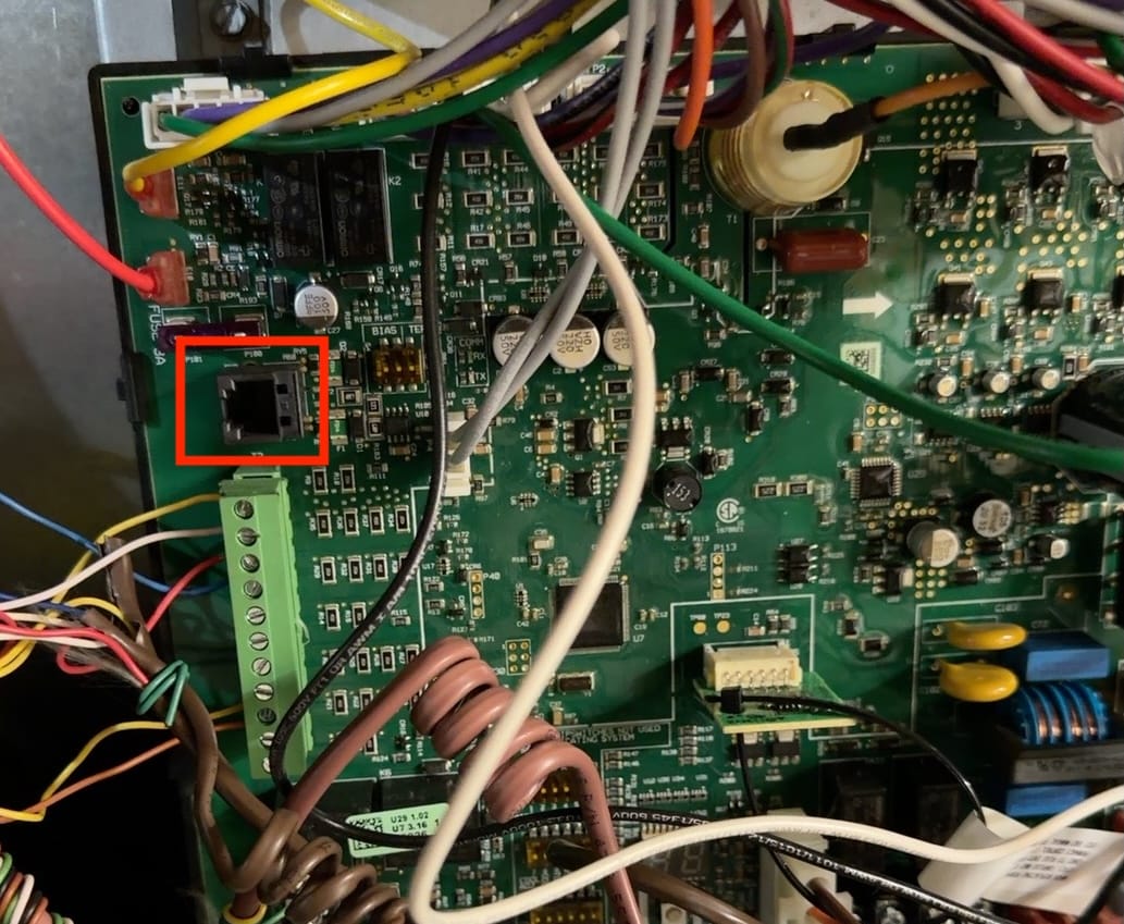 EcoNet communication port highlighted on a Rheem R98V furnace control board